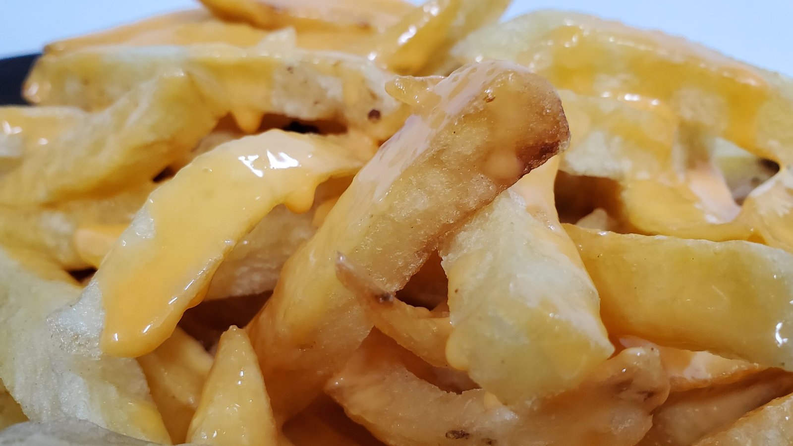 PAPAS FRITAS AL CHEDDAR